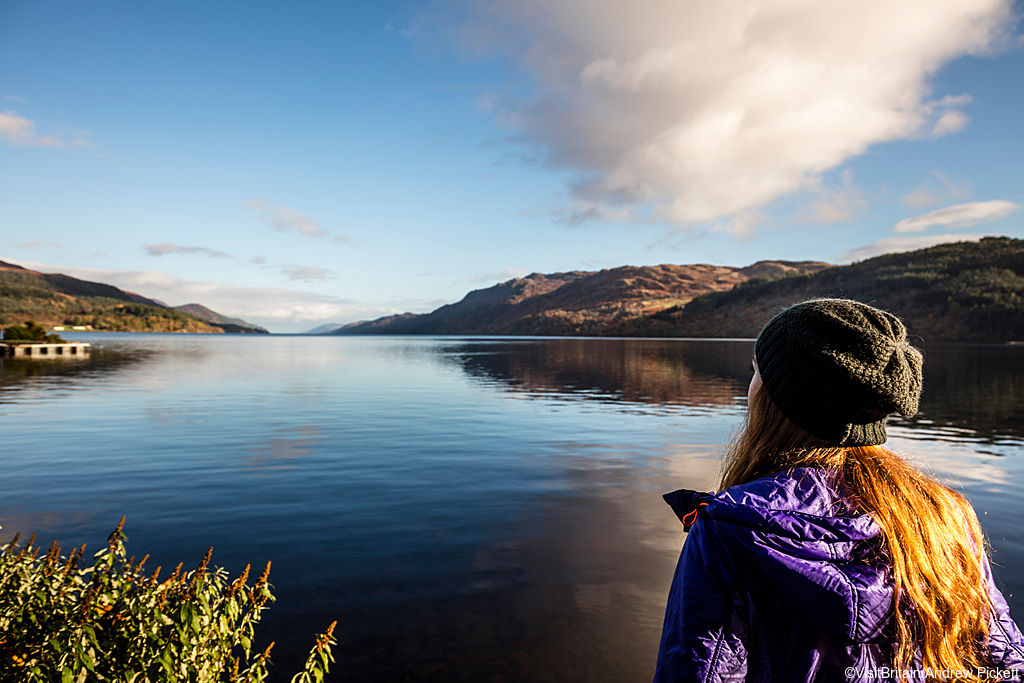 woman looking over loch